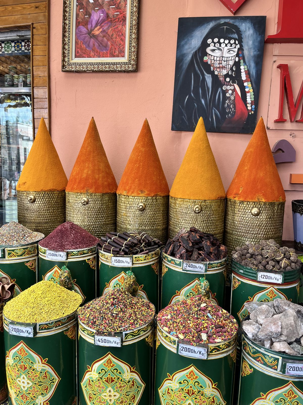 Cones of spices stacked in front of a shop