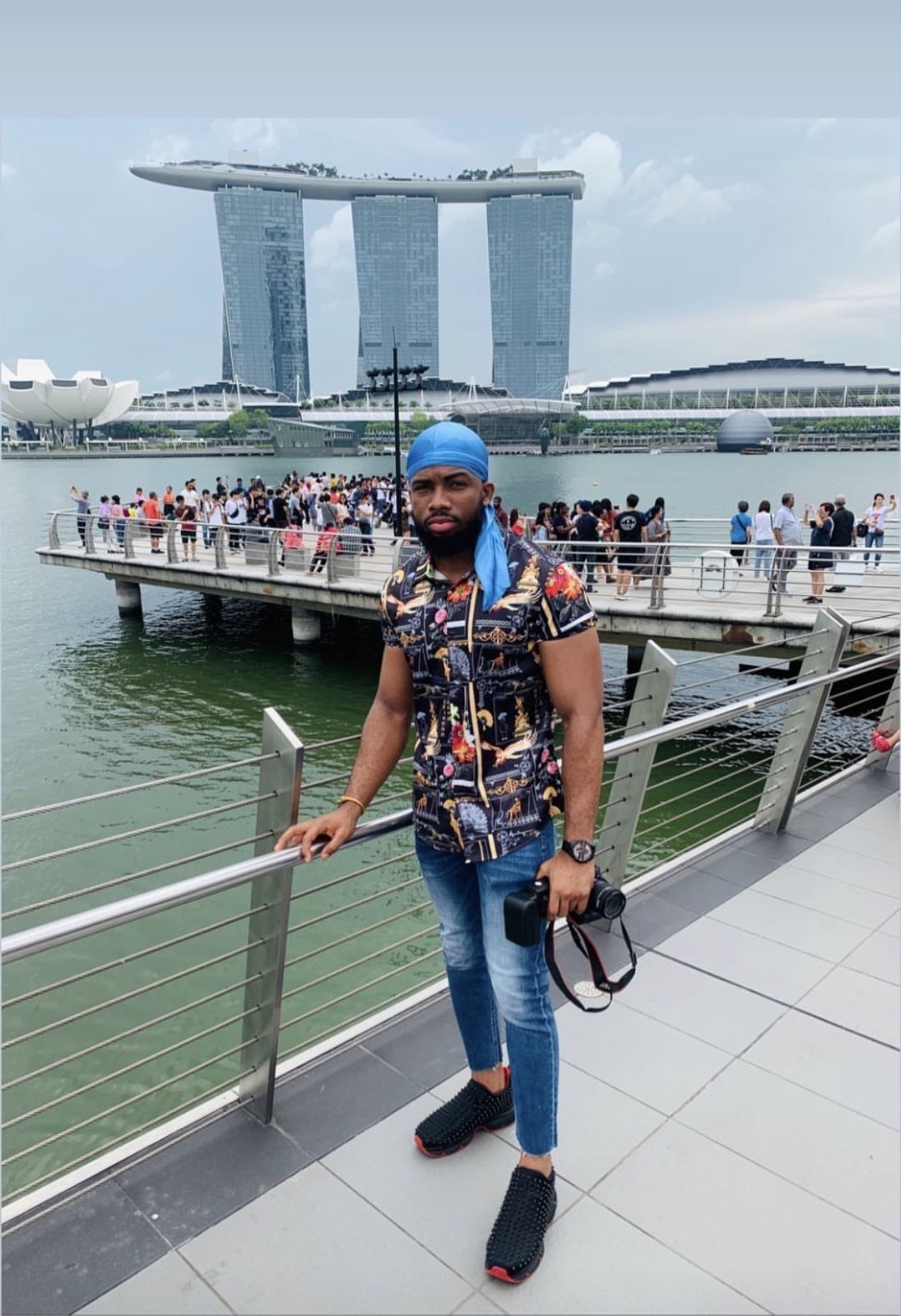 OJ on the waterfront with Marina Bay Sands behind