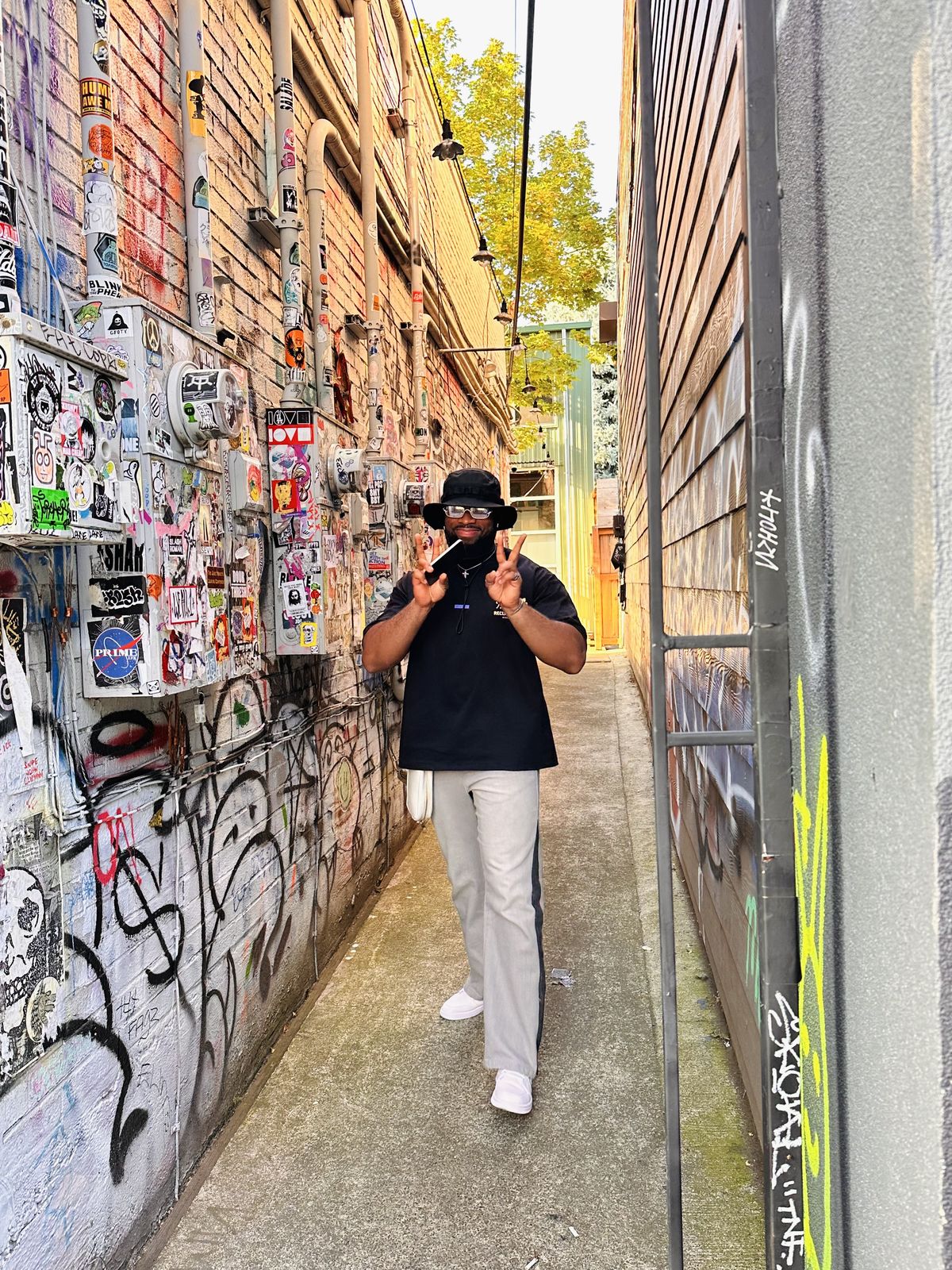 OJ in a graffiti-covered alley